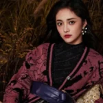 Zhou Jieqiong with celebgeeks.com